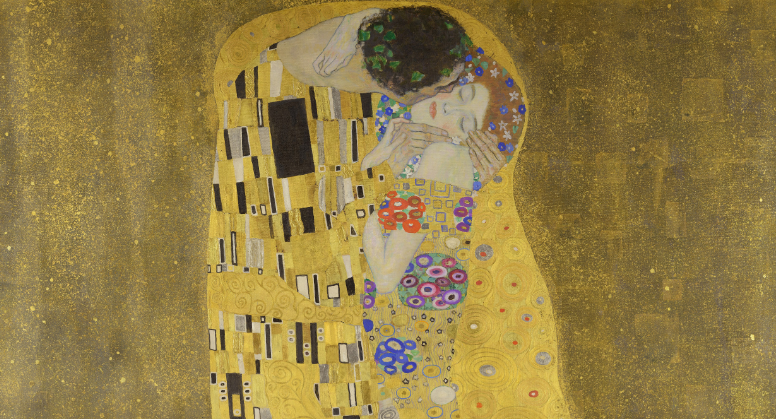 "The Kiss" by Gustav Klimt depicts a couple in a passionate embrace, enveloped in gold.